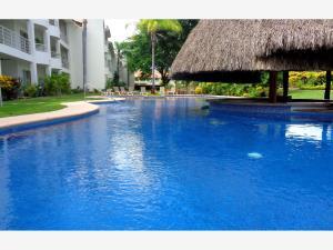 CONDOMINIO EN EL TIGRE CLUB DE GOLF EN RENTA