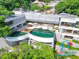 Casa en Las Brisas en renta vacacional. Con 7 recámaras, alberca y vista al mar Casa en Las Brisas en renta vacacional. Con 7 recámaras, alberca y vista al mar