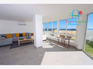 Con Vista a Puerto Marqués: Terraza, Jardín Privado y Jacuzzi para Disfrutar Acapulco