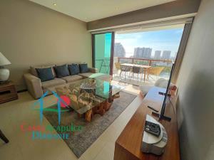 Departamento de playa en renta vacacional con terraza y vista parcial al mar