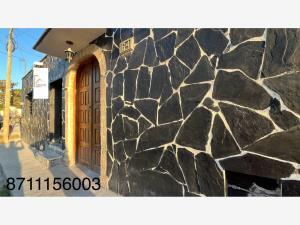 En venta hermosa y grande propiedad con ALBERCA Y HUERTO en Parras Coah