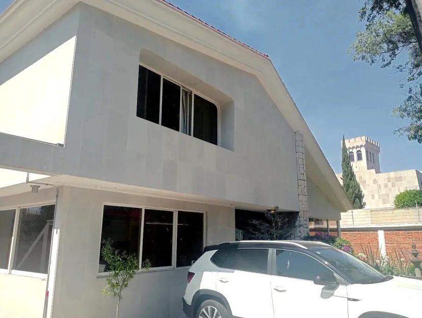 Foto 0 de Casa de Lujo en Venta en Bosques de las Lomas | 618 m², 4 Recámaras, Jardín, Terrazas y Salón | Id nn-wr1000121
