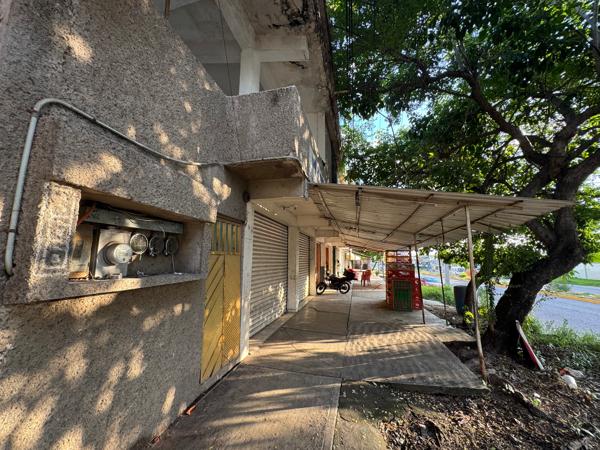 PROPIEDAD SOBRE EL LIBRAMIENTO JUNTO A FARMACIAS SIMILARES Y OXXO EN LÁZARO CÁRDENAS