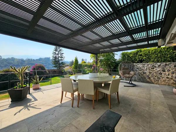 Casa en condominio en Lomas de Casa Blanca – Casa Gardea - con terraza, balcón y un fardin de mas de