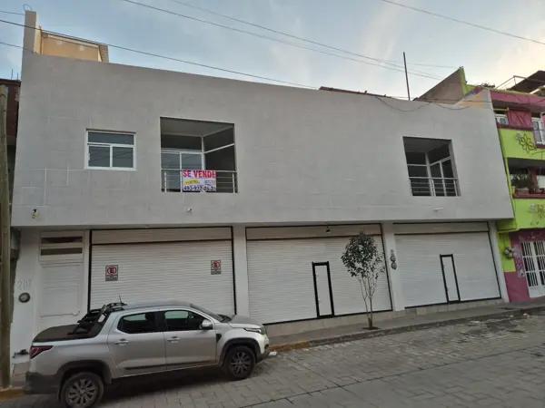 EDIFICIO USOS MIXTOS