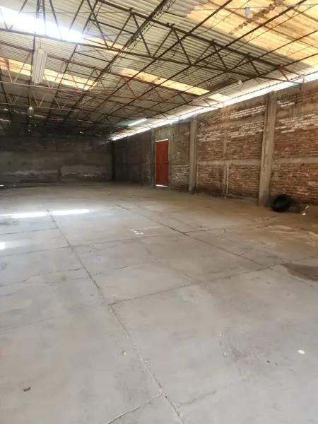TERRENO CON BODEGA Y CASA