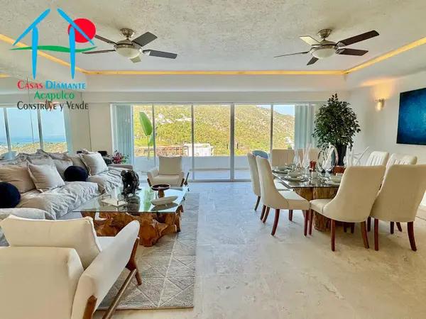Departamento con 3 recámaras y terraza con vista parcial al mar