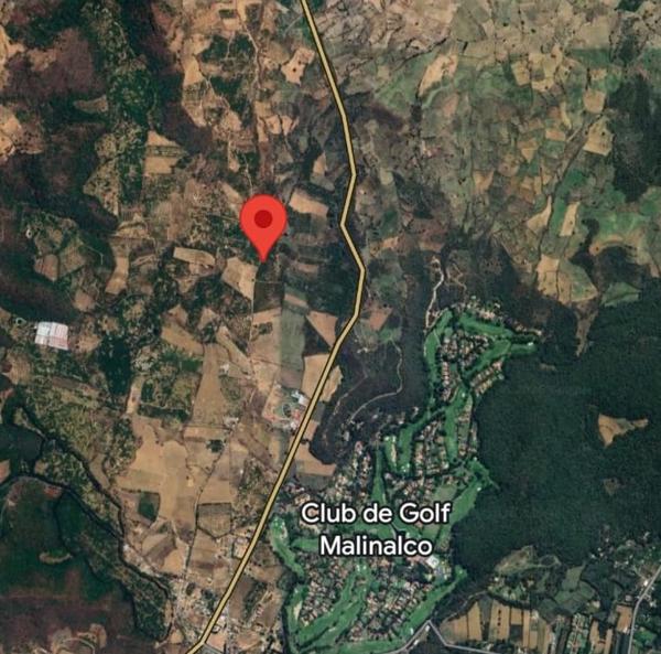 1 hectárea enfrente del club de golf