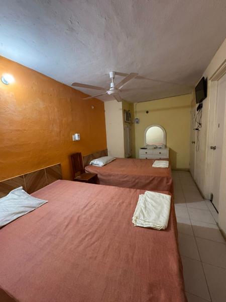 hotel en venta funcionando, se vende equipado , 22 paneles solares, a cuadra y media del mar.