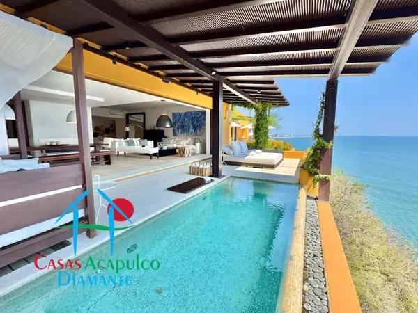 Departamento de lujo con 2 albercas privadas, 4 recámaras y vista al mar