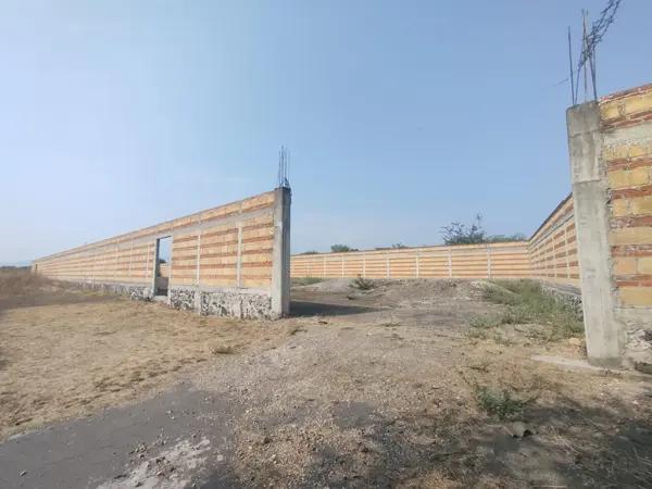Terreno Bardeado, junto a la Arena Teques en Tequesquitengo, Morelos