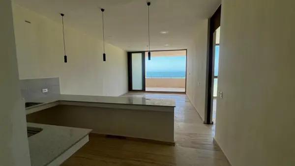 DEPARTAMENTO EN VENTA EN LA PLAYA, TELCHAC FRENTE AL MAR 2 RECAMARAS