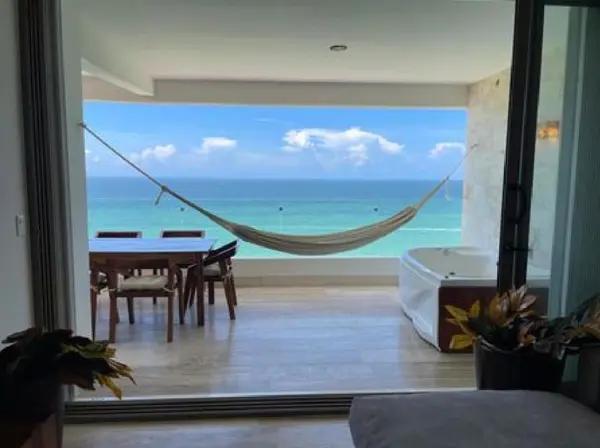 PUERTA DEL MAR // VENTA DE DEPARTAMENTO FRENTE AL MAR AMUEBLADO,  EN LA PLAYA DE CHICXULUB, YUCATÁN.