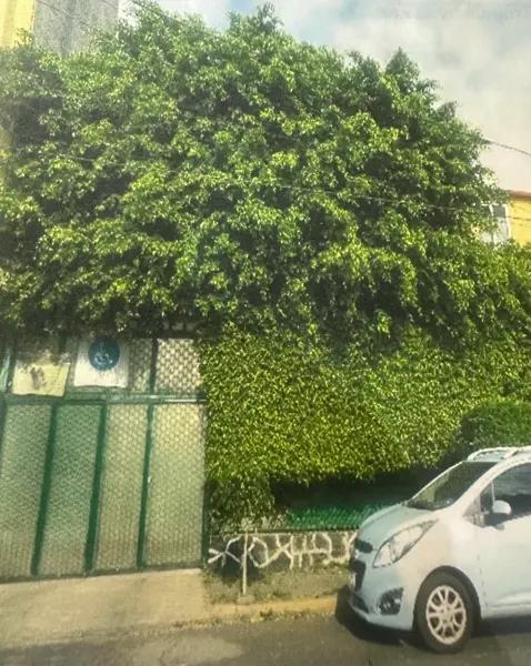 Casa de dos pisos en Presidentes Ejidales, Coyoacán - 4 recámaras y 3 estacionamientos - $5,075,000